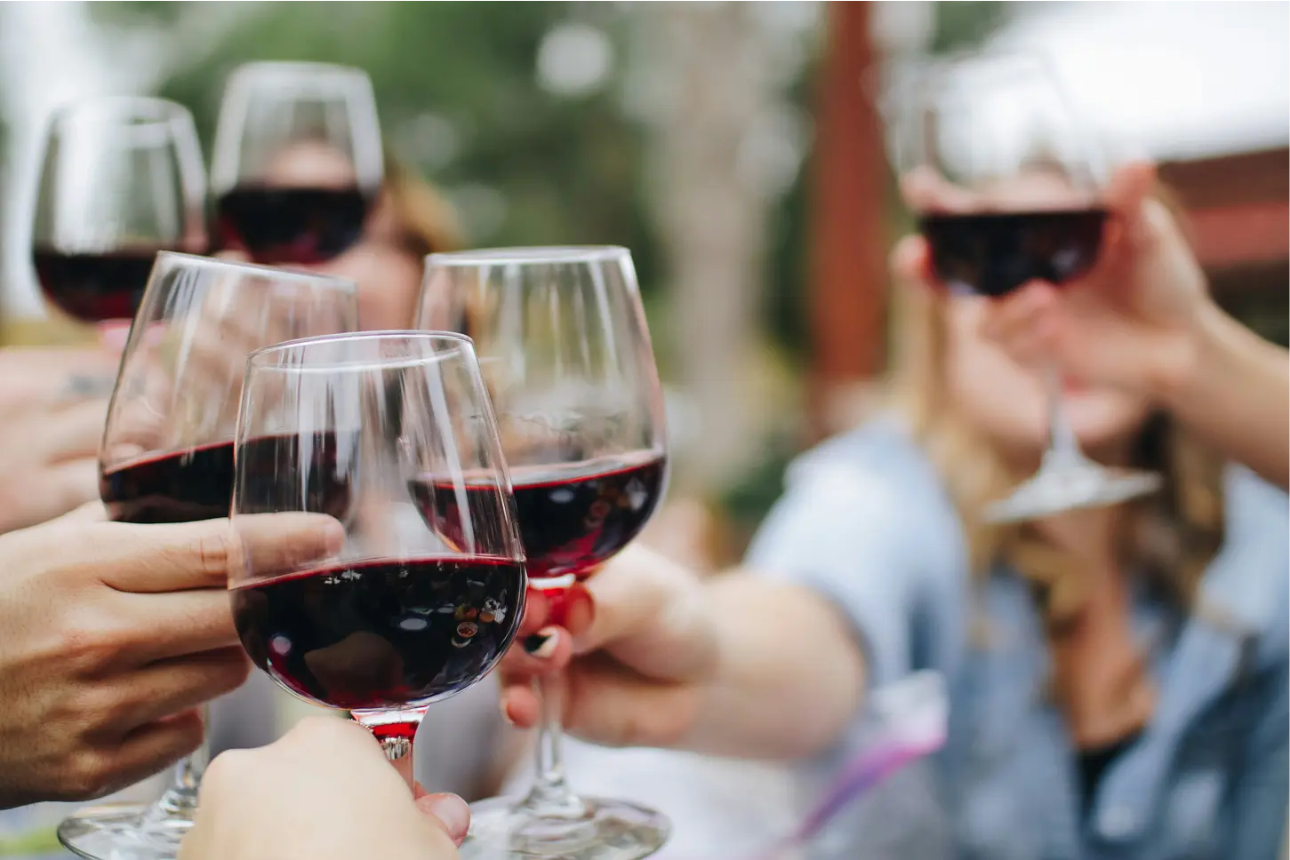 People with multiple wine glasses